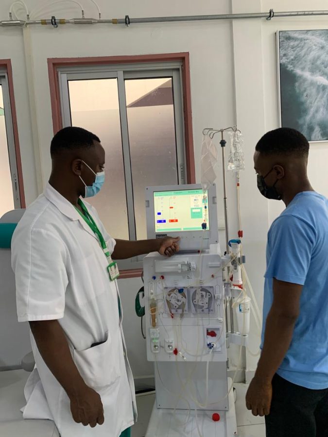 Hospital technician trained on a B. Braun Dialog hemodialysis machine at the hemodialysis centre, Hôpital Général de Douala