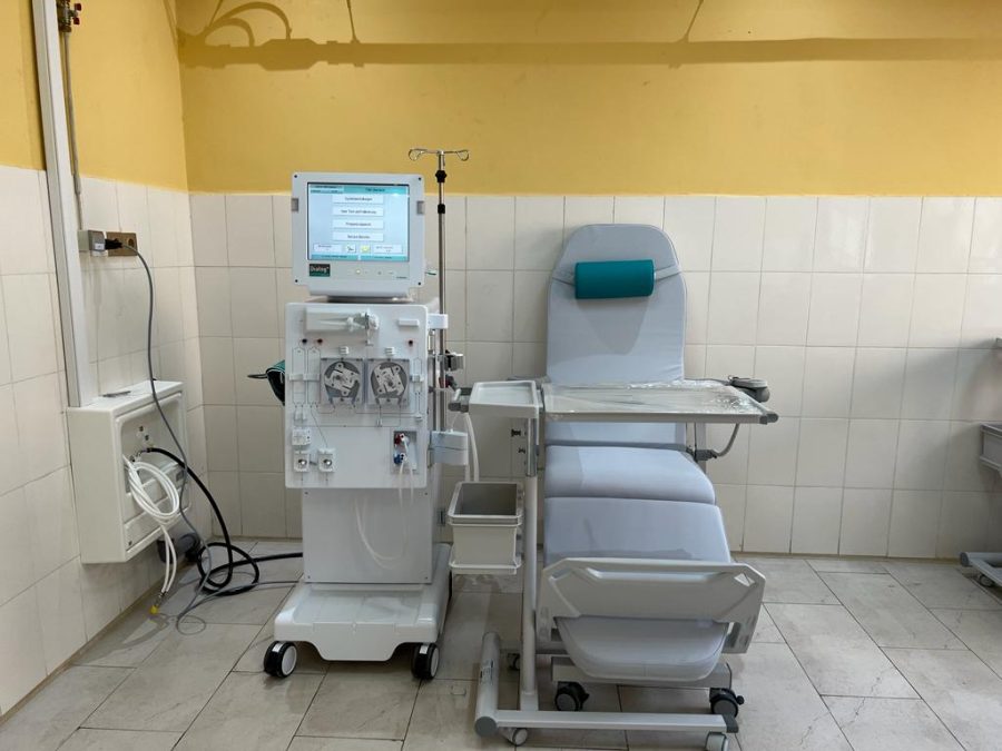 Row of dialysis treatment posts with machines and chairs by the windows of the new Ngaoundéré hemodialysis centre