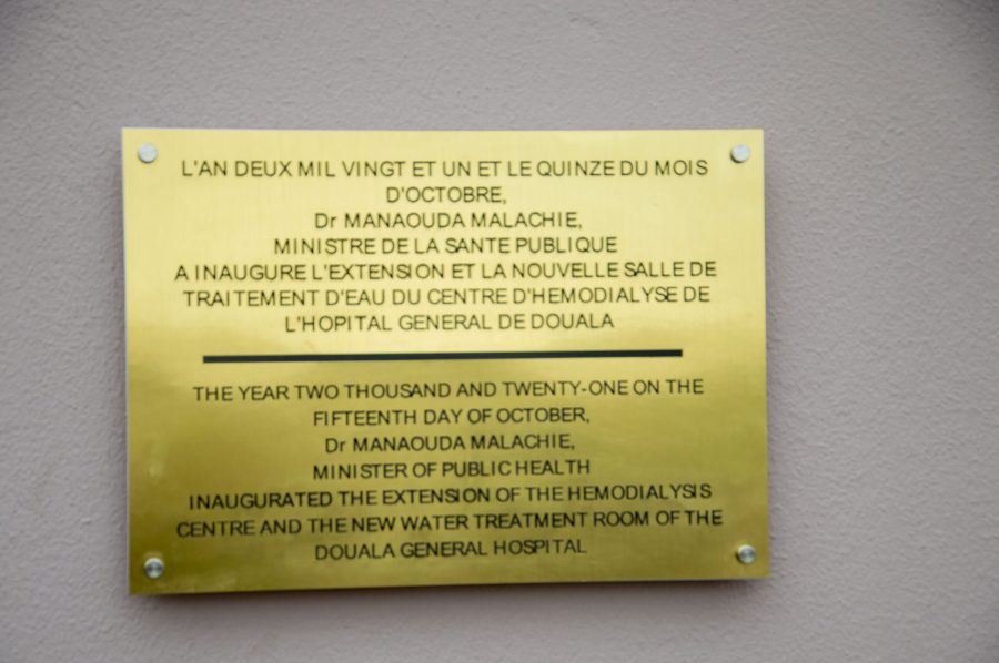 Bilingual commemorative plaque marking the inauguration of the hemodialysis centre extension and water treatment room at Douala General Hospital