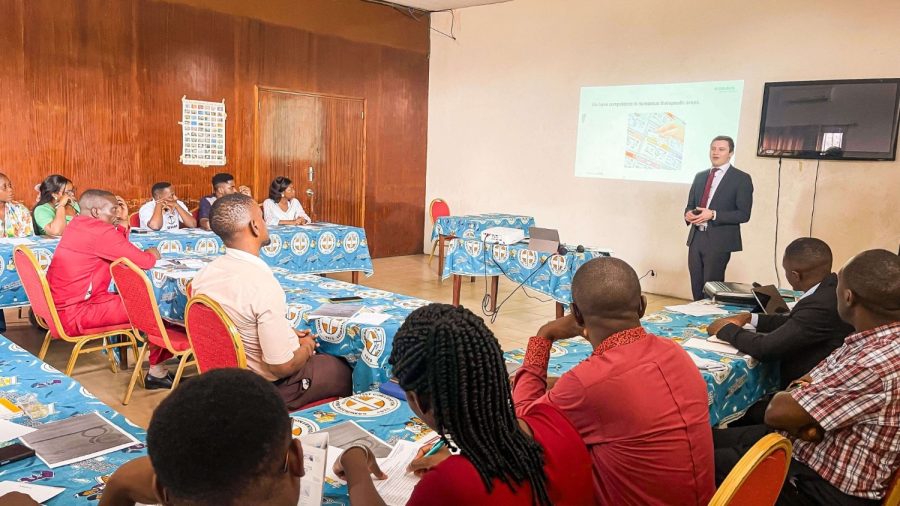 Physicians and nurses from CBC Health Services practicing suturing technique on a training pad